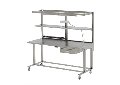 Stainless prep and pack station have adjustable height, overhead light, magnification light, CPU holder, electrical strips